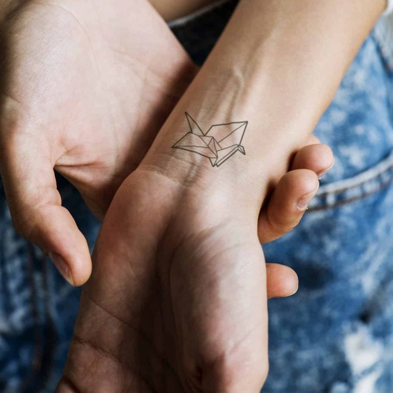 Tiny fine line tattoo service creating delicate, minimalist designs at Inked Beauty Bar.
